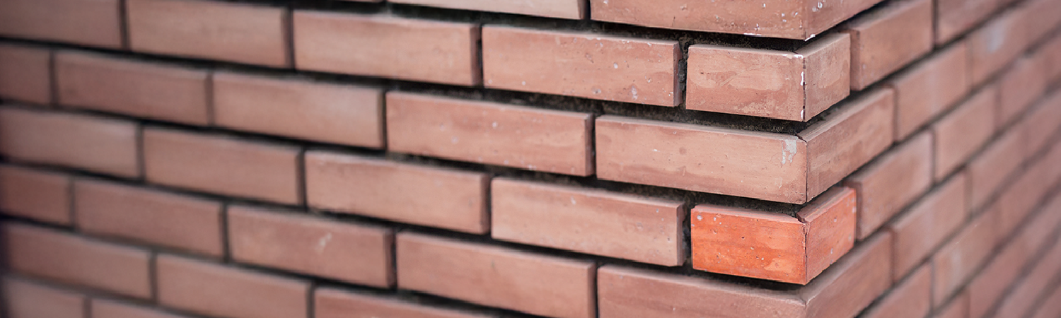 A brick wall representing a cornerstone