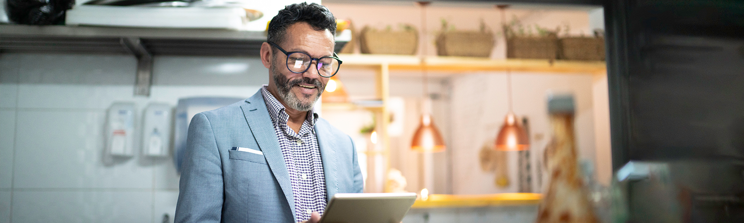 business man working on his tablet computer